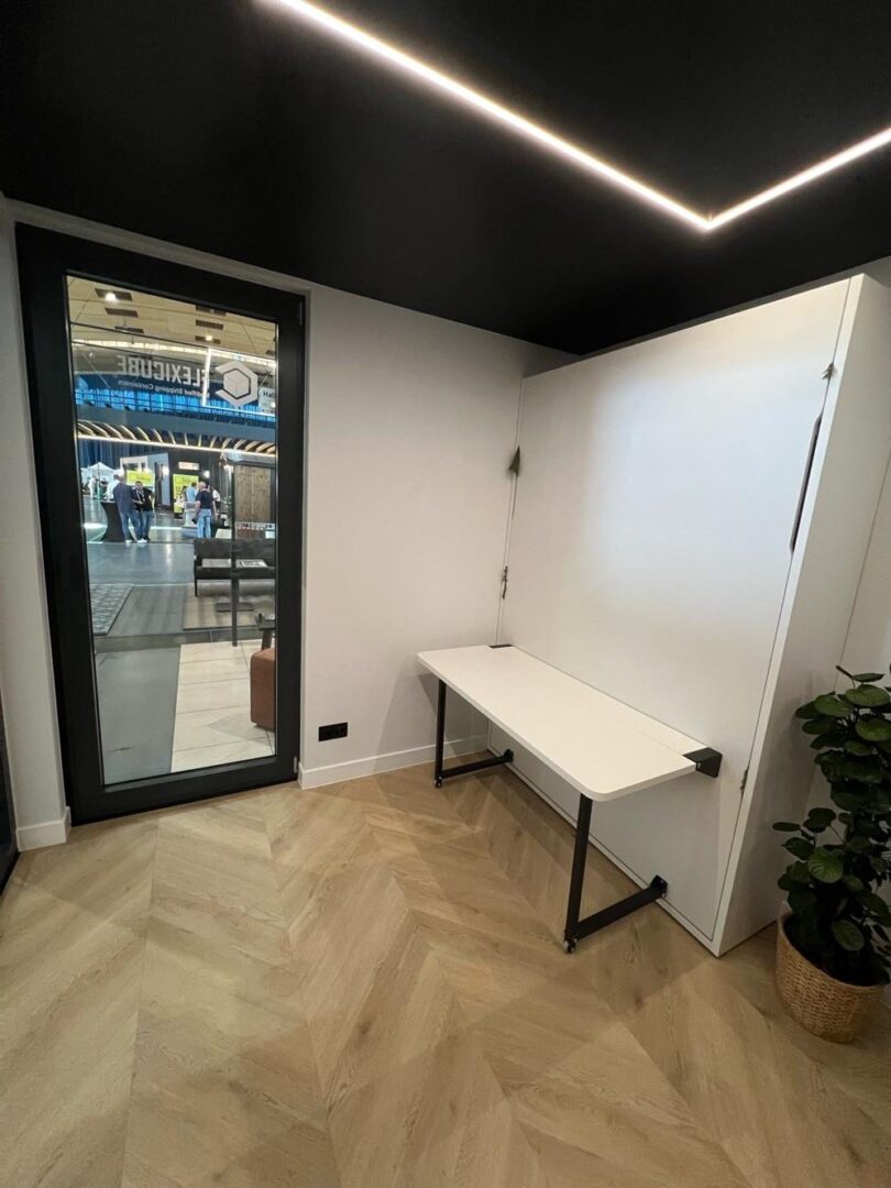 SmartBed folded into desk position in the L15 XL Showroom