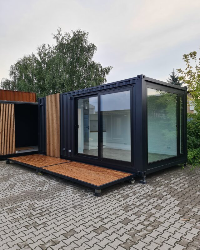 Transform your shipping container home with a stunning facade! 🏠 Whether you want to add a touch of elegance with a small panel or completely cover the container’s structure, our range of cladding options has got you covered! L15XL (3m wide) & L15 garden#ContainerLiving #cladding #containerhome #containerhouse #containerhomes #tinyliving  #containersolutions #flexicube #modernhouse #shippingcontainerhome #shippingcontainerhouse #containeroffice #cabin #cabinlife #containerbuilt