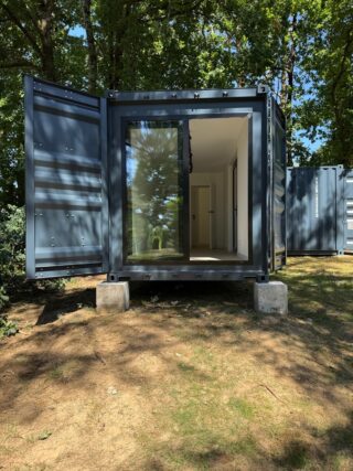 Our L-shaped container home has officially arrived in France! 🇫🇷🏡 One more step closer to becoming a beautiful place to call home 🏡✨#containerhome #modularhome #modernhome #container #tinyhome
